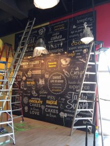 La Coste Sign Company vinyl wall mural indoor install 225x300